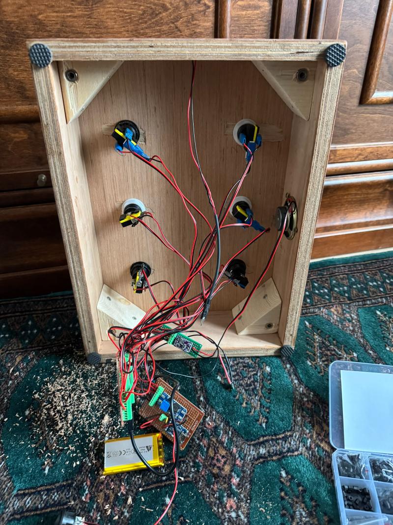 Inside of the six-button box with all buttons wired to the board